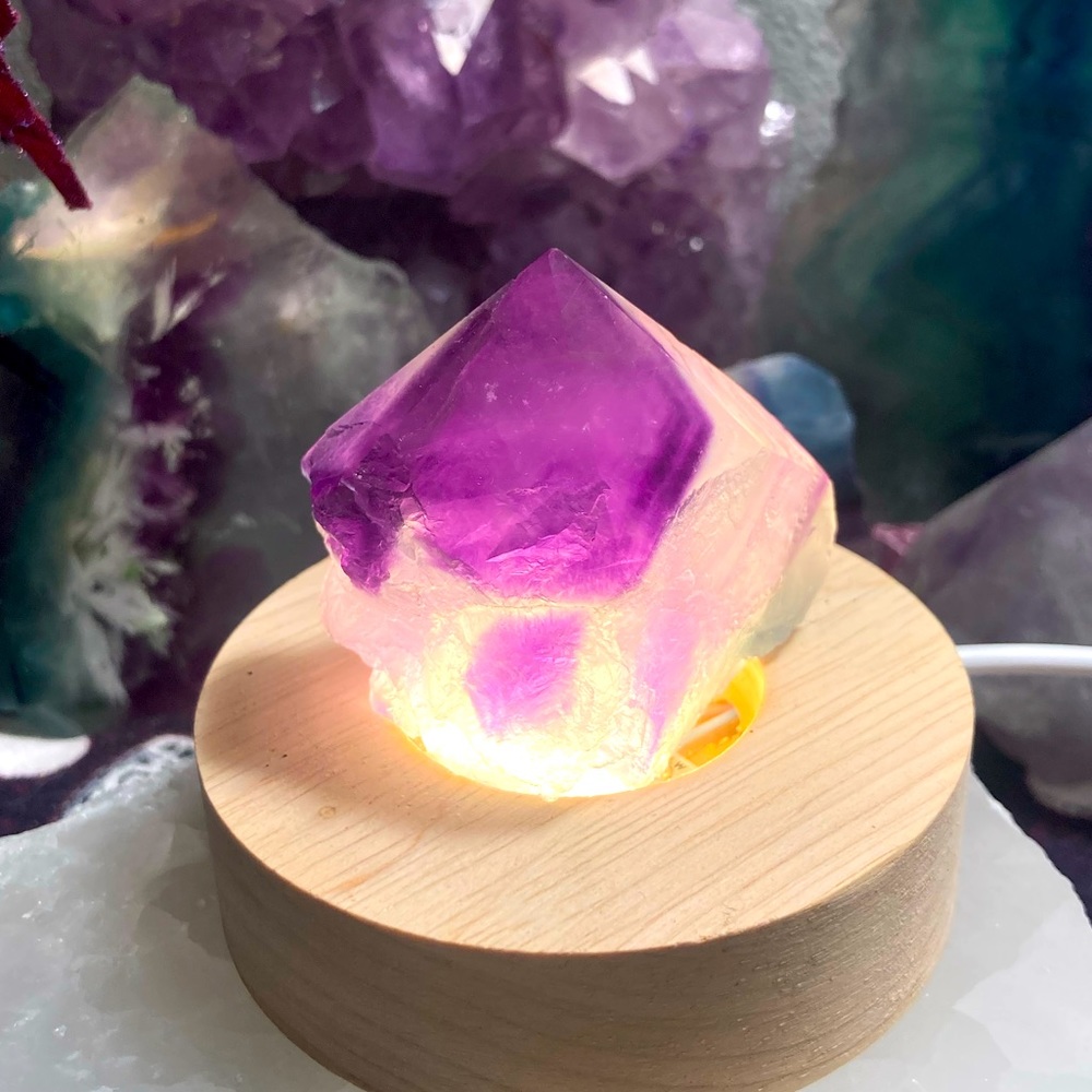 Small rough purple and clear flourite point